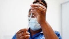 UK Covid Vaccine Rollout Hailed as Historic Achievement, But Support for the Harmed Must Improve